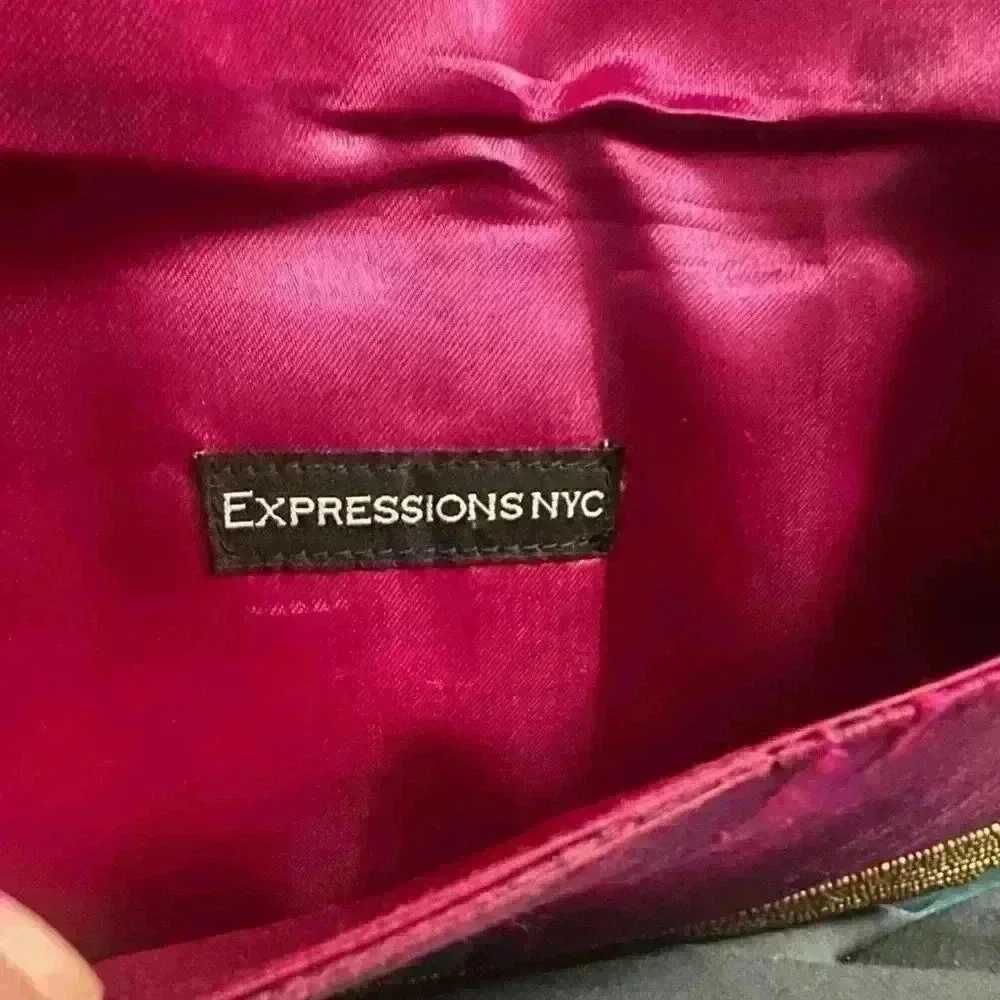 ExpressionsNYC clutch. Pick with gold beads. Good condition pink sink inside